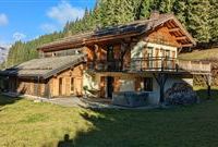LOVELY CHALET ON A LARGE WOODED LOT