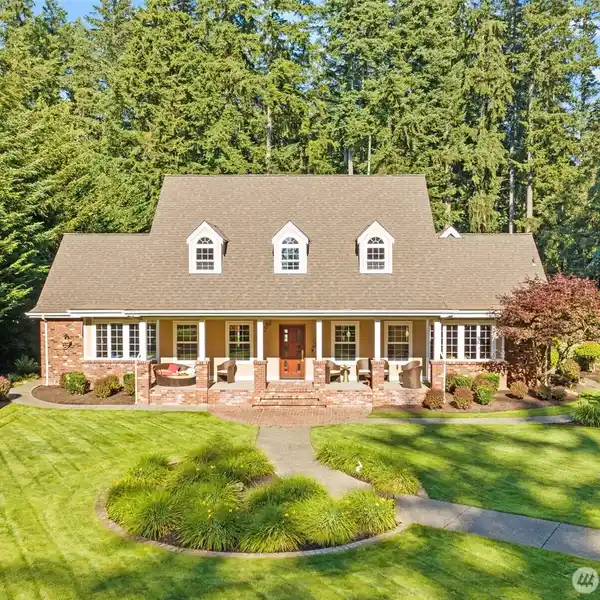 CUSTOM HOME WITH MASSIVE ADU & STUDIO