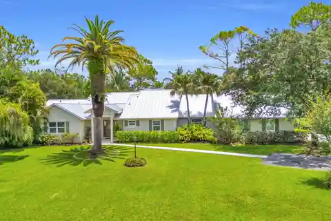 Tropical Poolside Living on Expansive Acreage