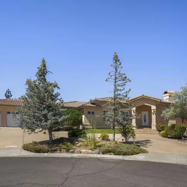 CUSTOM HOME BACKING TO WOLF RUN GOLF COURSE