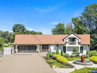 Stunning Spanish Villa-Style Estate with Million-Dollar Skyline Views