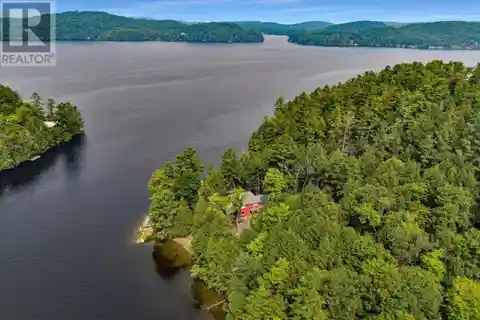 Rare Lakefront Retreat with Dual Deeded Properties