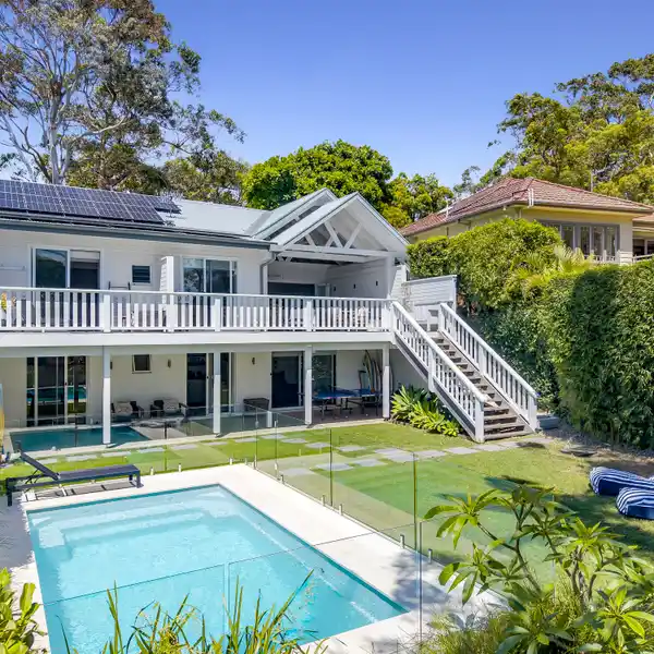 COASTAL RETREAT WITH CATHEDRAL CEILINGS AND POOL