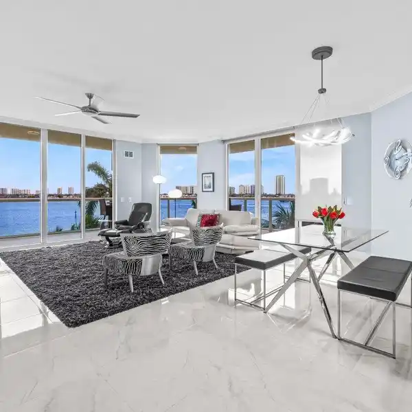 TURNKEY FURNISHED END UNIT WITH WRAPAROUND BALCONY