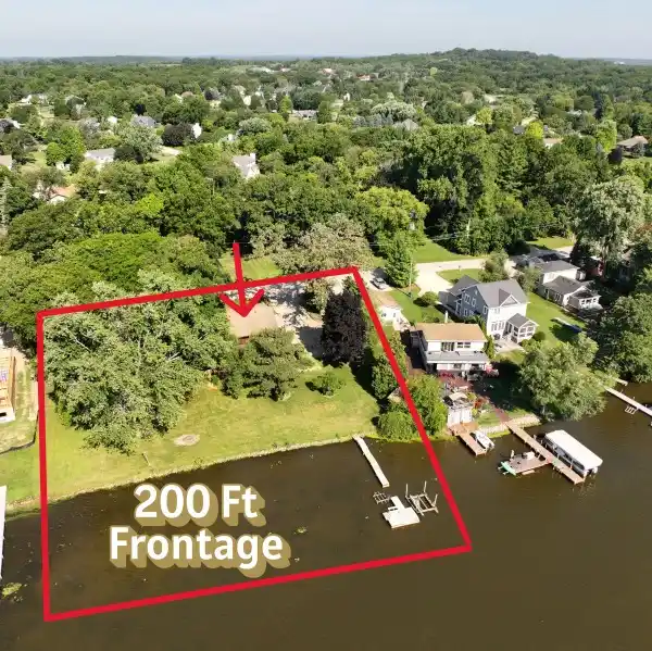RARE RIVERFRONT ESTATE WITH 200’ FRONTAGE