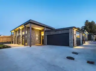 Grand Dual-Residence Estate in Prestigious Swanson Enclave