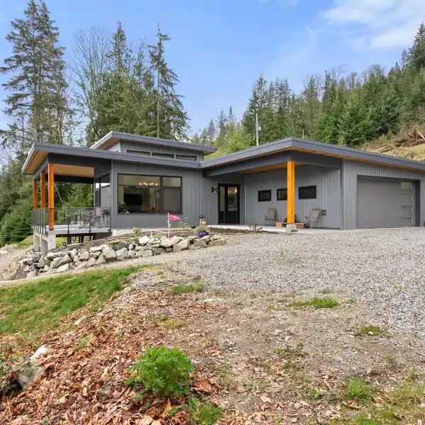 PRIVATE WATERFRONT ESTATE WITH SWEEPING CHANNEL VIEWS