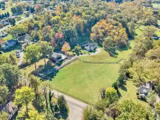Brick Main Home with Sleek Modern Guesthouse