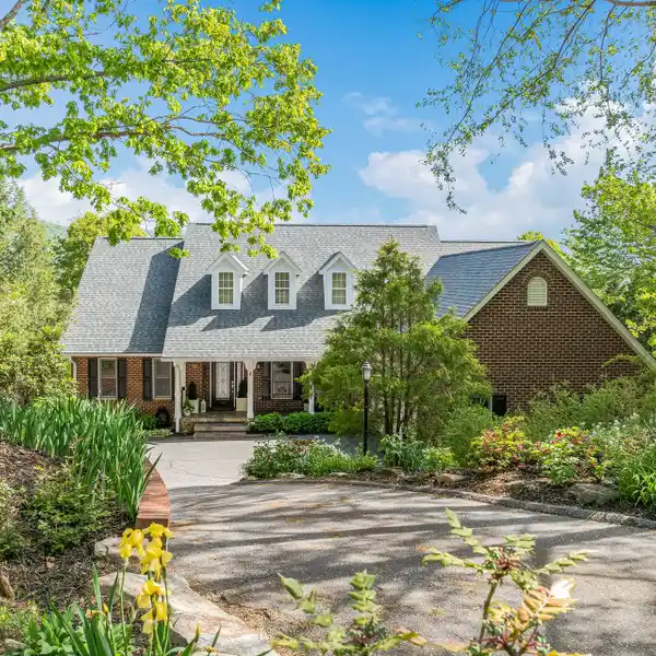 ELEGANT BRICK HOME IN THE REEMS CREEK GOLF COMMUNITY