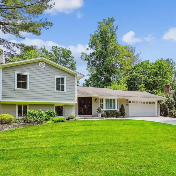 IMPECCABLY UPDATED HOME ON MANICURED PROPERTY