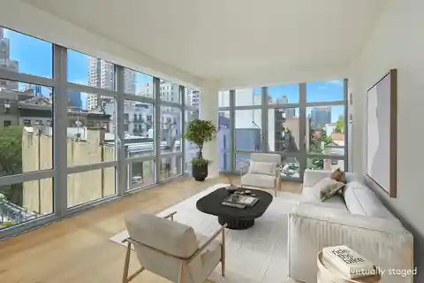 Sun-Filled Corner Residence at the Link Condominium