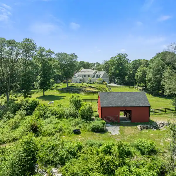 LUXURY MODERN FARMHOUSE WITH BARN ON OVER TEN ACRES