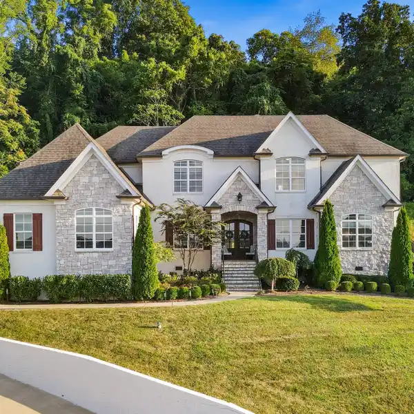 ELEGANT ENTERTAINER’S HOME WITH CUSTOM OUTDOOR OASIS