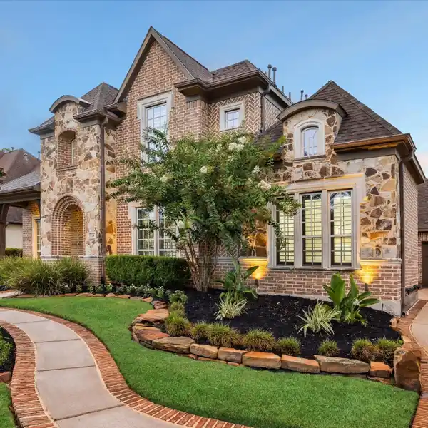 SPACIOUS CREEKSIDE HOME WITH LUXURY UPGRADES