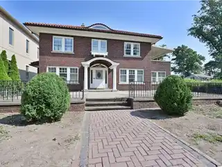 Charming Brick Lakefront Home on Expansive Lot