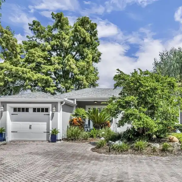 SERENE WATER VIEWS ON 75 FEET OF LAKE FRONTAGE