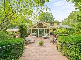 Elegant Estate with Lush Gardens and Timeless Design