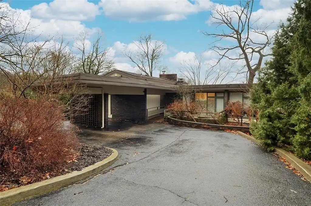 Mid-century Modern Home in a Private Wooded Enclave