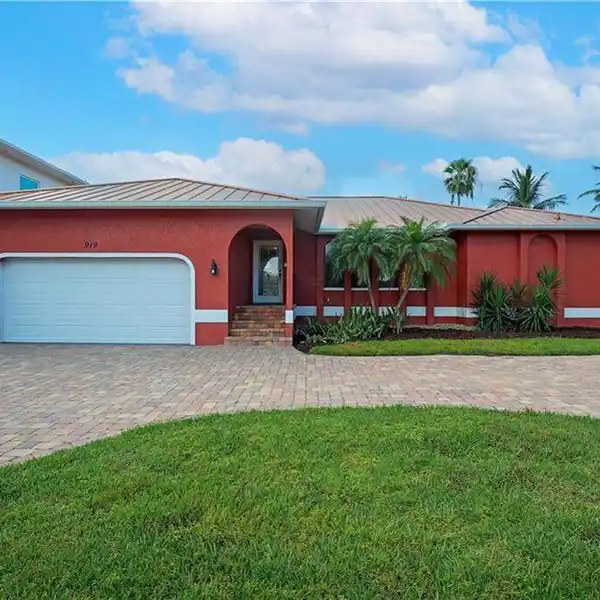 MOVE-IN READY WATERFRONT HOME WITH BOAT & JET SKI LIFTS