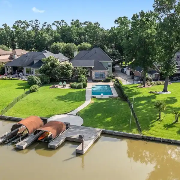 GATED WATERFRONT GEM WITH TWO BOAT SLIPS