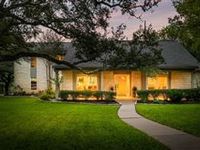 THIS BEAUTIFULLY UPDATED RESIDENCE OFFERS UNPARALLELED PRIVACY