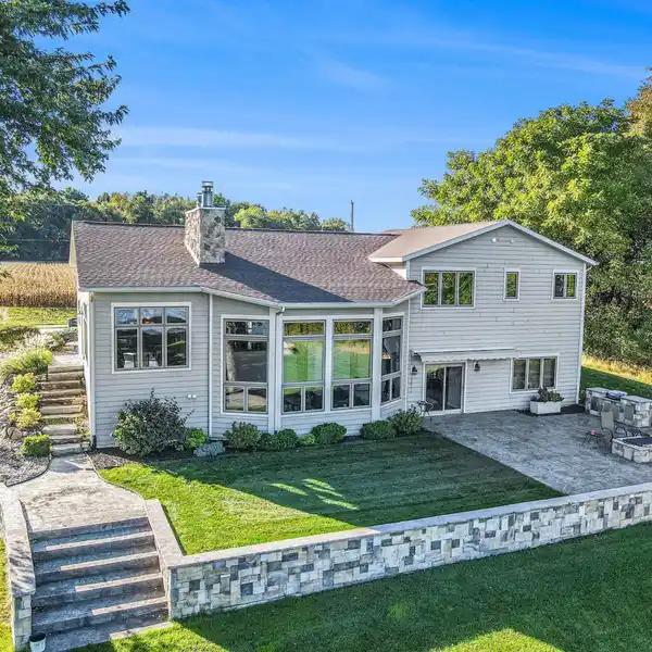 ELEGANT LAKEFRONT RETREAT WITH SOARING DESIGN