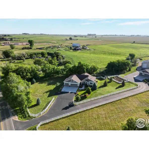 TWO CUSTOM HOMES ON FIVE-PLUS ACRES