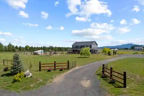Expansive Farmhouse Retreat with Modern Upgrades