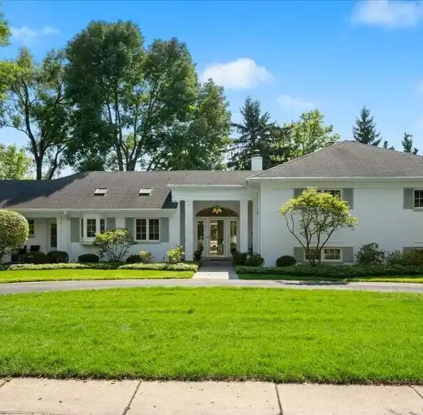TIMELESS WHITE BRICK SPLIT-LEVEL HOME
