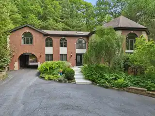 Massive Single Family Home Surrounded by Foliage