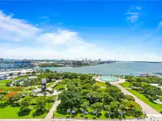 Wraparound Balcony with Iconic Bay and City Views