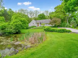 Hilltop Luxury Retreat with Tranquil Pond Views