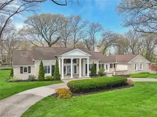 Expansive Residence on Meticulously Landscaped Grounds