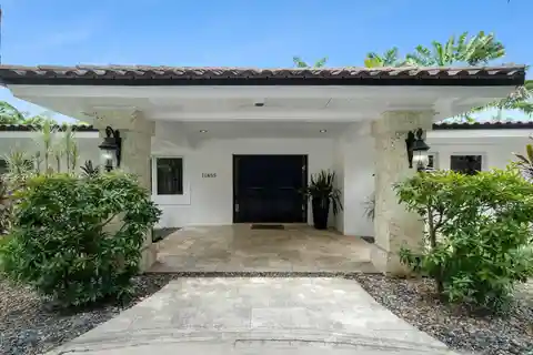 Elevated Living in Gated One-Acre Pinecrest Estate