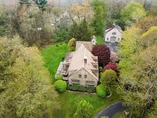 Gracious Contemporary Cape with a Custom Barn