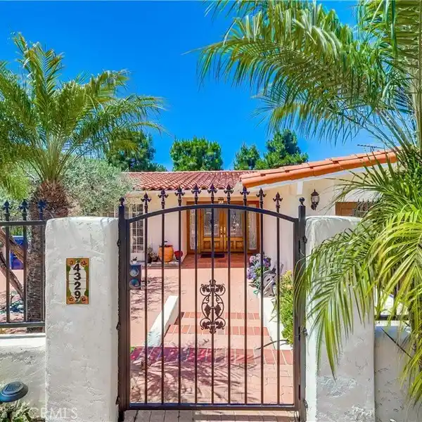 ELEGANT SPANISH-STYLE HOME WITH STUNNING CANYON VIEWS