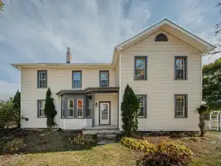 Unique 1890's Farmhouse Filled with Charm and Character