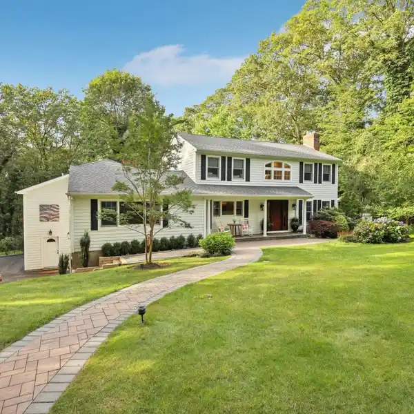 PICTURESQUE COLONIAL ON OVER TWO PRIVATE ACRES