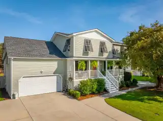 A Truly Turn-Key Experience on a Quiet, Lush Lot