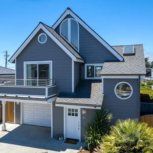 BEAUTIFULLY REMODELED BEACH HOME STEPS TO THE SAND