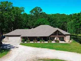 Secluded Acreage Retreat with Massive Workshop