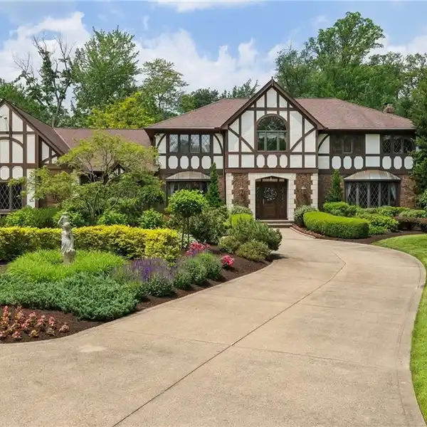 TIMELESS TUDOR RETREAT ON FIVE LUSH ACRES