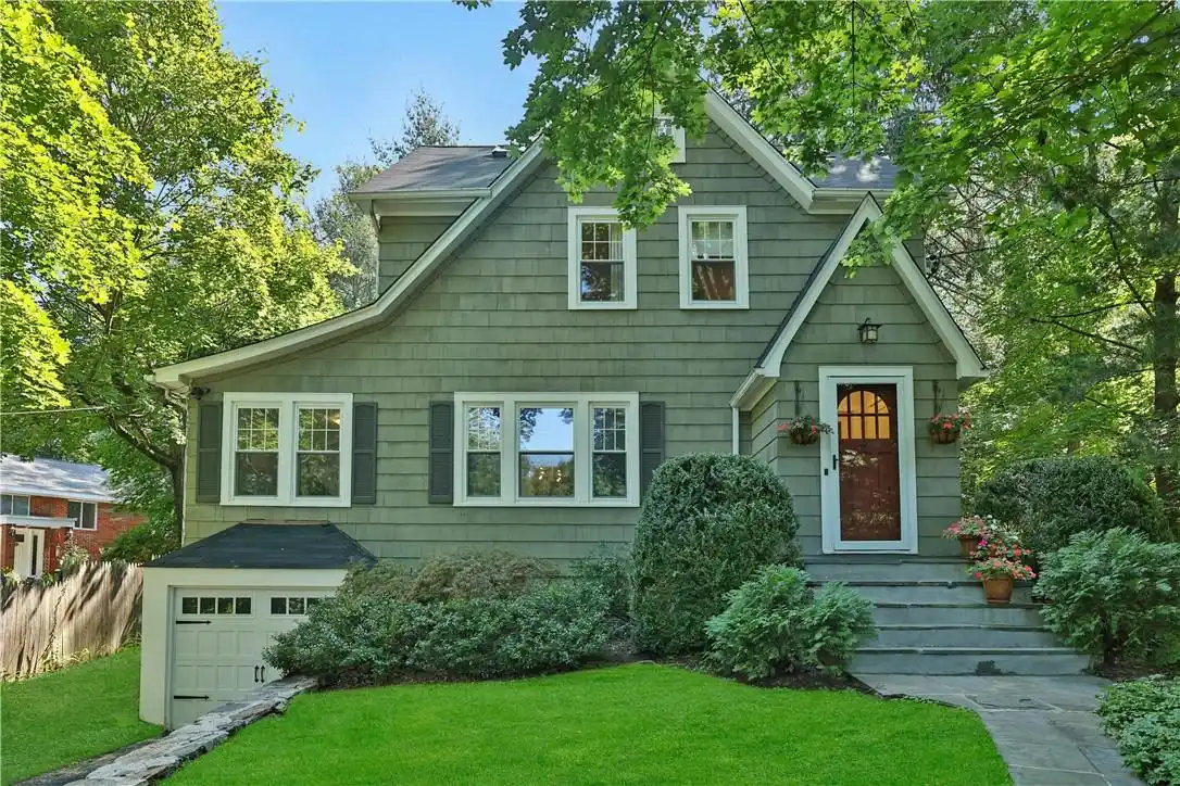 Renovated Storybook 1930s-era Tudor-style Shingle Cottage