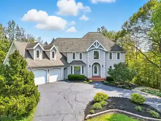 Beautiful Colonial Home Situated on Three Picturesque Acres