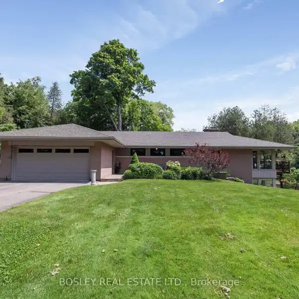 PRIVATE WOODLAND PARADISE WITH POND AND TRAILS