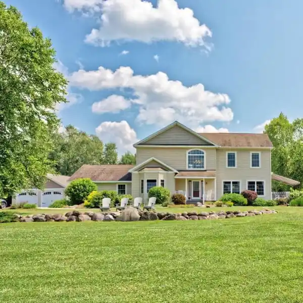 STUNNING LAKEFRONT ESTATE WITH EXCLUSIVE BEACH RIGHTS