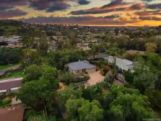 Stained Hardwood Floors and Exposed Wood Beams