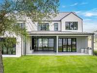 EXCEPTIONAL RESIDENCE IN GATED LONG COVE