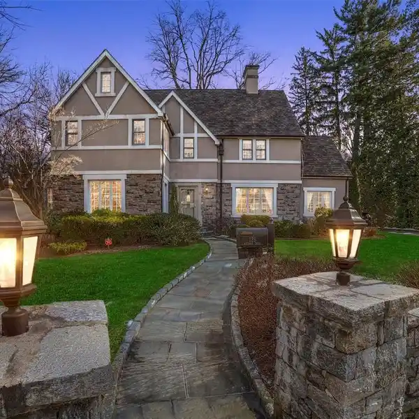 CLASSIC AND STYLISH TUDOR-STYLE HOME  IN LAWRENCE PARK WEST