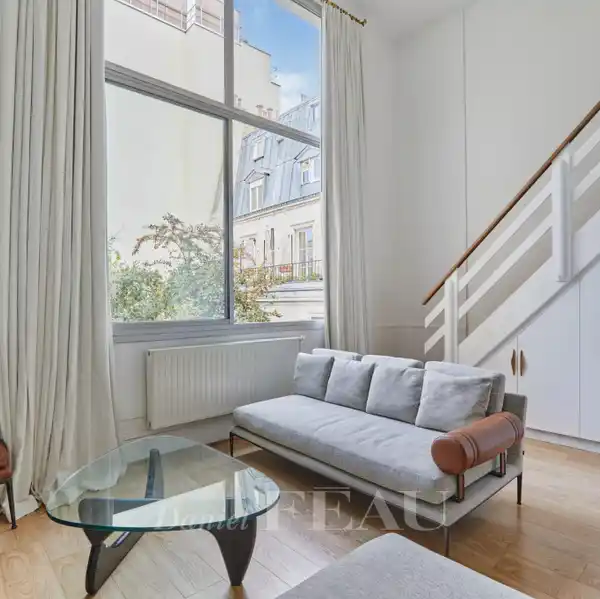 ARTISTIC DUPLEX WITH DRAMATIC LOFT-STYLE AMBIANCE